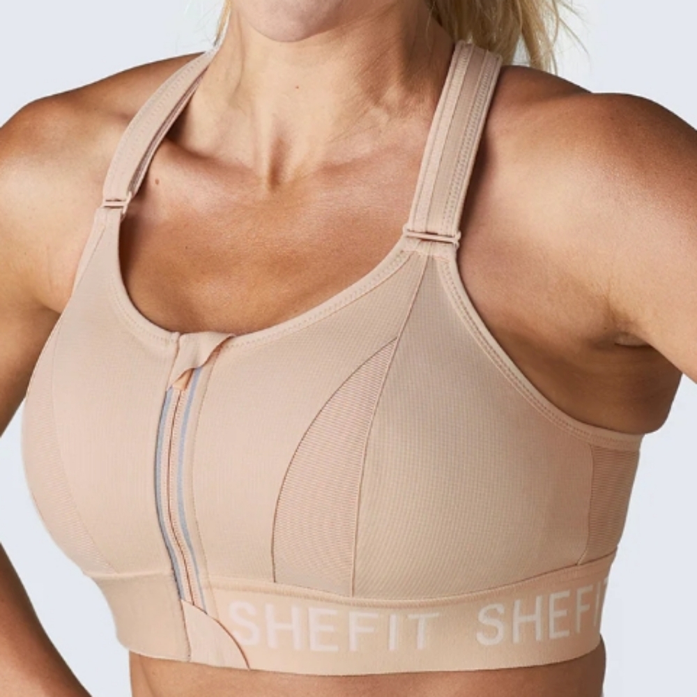SHEFIT The Ultimate Sports Bra High Impact Nude Womens Size Medium NWT Wash Bag